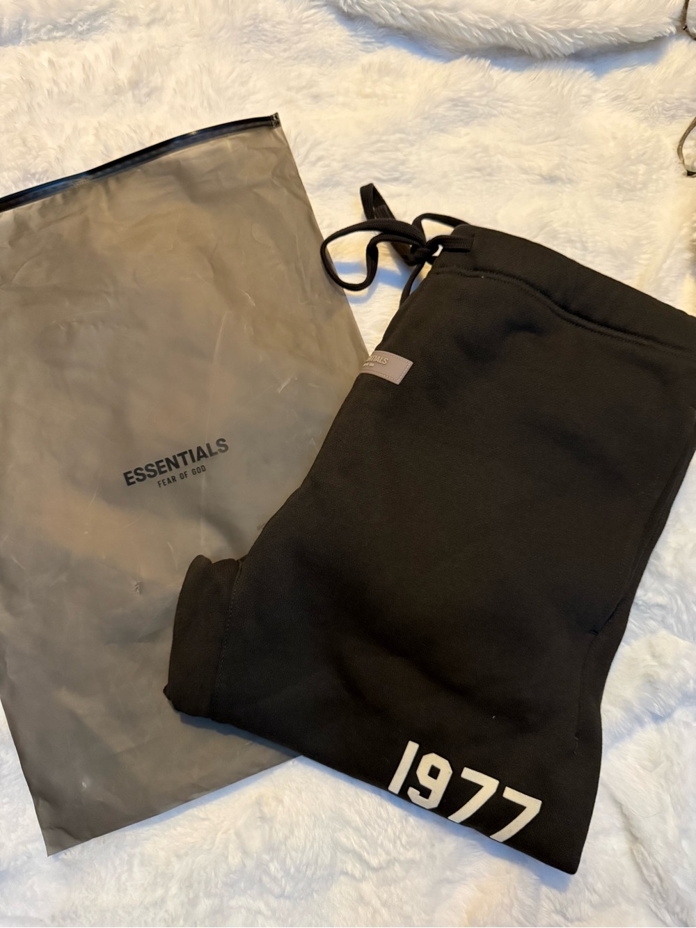 Fear of God Essentials Black Sweatpants with White '1977' Print